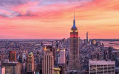 the empire building in new york city at sunset
