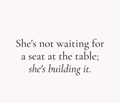 a black and white photo with the words she's not waiting for a seat at the table, she's building it