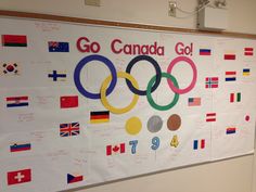 Olympic bulletin board with the medal count. Christmas Olympics Board, Olympics Display Classroom, Olympic Medal Count Chart, Olympics Board Ideas, Olympic Board Ideas, Summer Olympics Medal Tally, Olympic Decorations Classroom, Olympics Board, Olympic Bulliten Boards