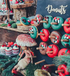 an assortment of doughnuts and pastries on display