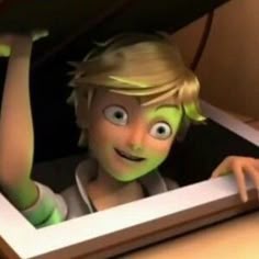 a young boy with blonde hair and green eyes is looking through a window at something