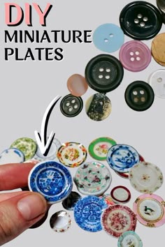 a hand holding a button and pointing to it with the words diy miniature plates