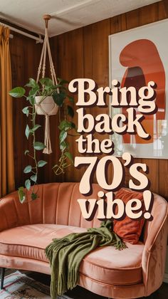 a pink couch sitting in front of a window with the words bring back the 70's vibe