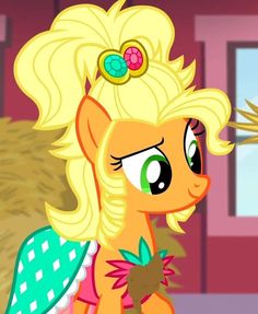 a pony with blonde hair and green eyes