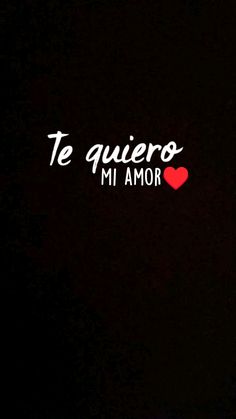 a black background with the words te quiero mi amor and a red heart