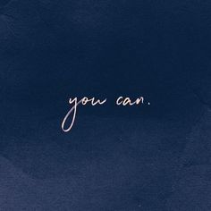 the word you can written in cursive writing on a dark blue paper background
