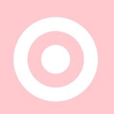 a white circle on a pink background