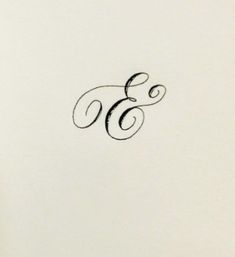 the letters e and f are in cursive writing on white paper with black ink