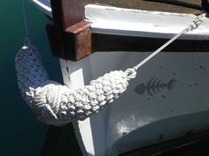 a rope attached to the side of a boat