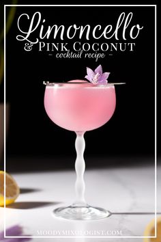 a pink cocktail in a glass with lemon slices around it and the words limoncello & pink coconut cocktail