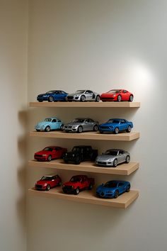 there are many toy cars on the shelves