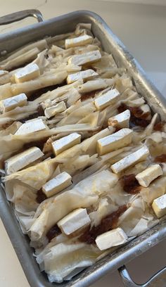 a pan filled with banana slices and sauce