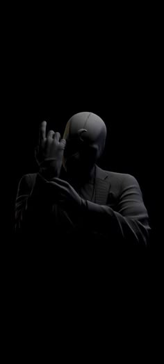 a man in a suit and helmet drinking from a bottle