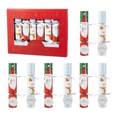 twelve bottles of christmas wine in a red gift box with white ribbon around the top