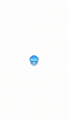a blue jellyfish floating in the water on a white background with copy space for text