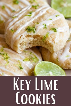 key lime cookies with icing and fresh limes on the side for garnish