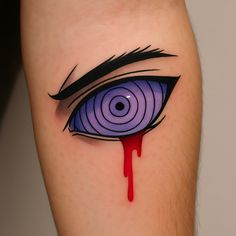an eye tattoo with blood dripping down the middle of its iris's eye and red liquid coming out of it