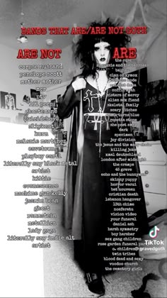 a woman in a long black dress with words on it