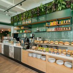 the inside of a fast food restaurant with green walls