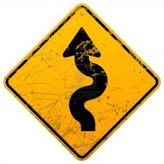 a yellow and black road sign with a curved arrow on the bottom, in front of a white background