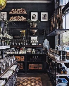 an old fashioned store with lots of items on the shelves