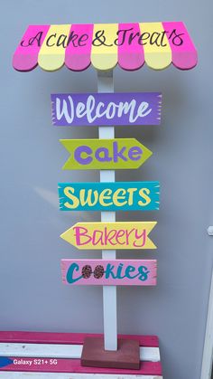 there is a sign that says welcome to cakes and treats