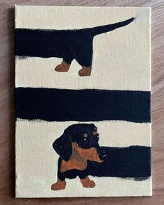 a black and brown dachshund dog painted on canvas