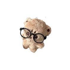 a teddy bear wearing glasses is flying through the air with its head in the air