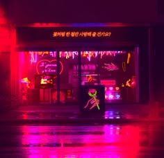 a store front with neon lights in the background