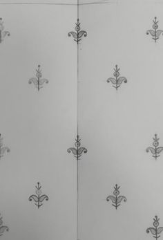 an open book with black and white designs on it