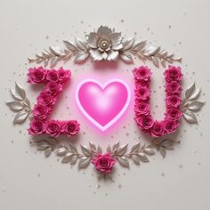 the word love spelled with pink roses and silver leaves on a white background surrounded by flowers
