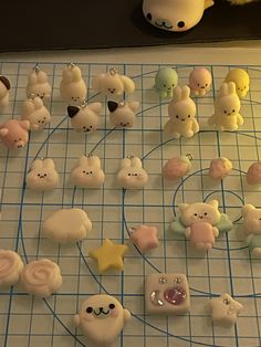 there are many small toy animals on the table