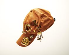 This unisex dad hat is 100% premium cotton with a buckle closure.  Crown - measures 5"H, Brim - measures 2.75" L and 7.5" W. Each brooch is carefully curated and has its own individual story. They are all one of a kind and come from all over the world, uniquely combined. Dope Hats, Unique Hats, Head Covering, Fashion Statement, Fashion Games, Caps Hats, Accessories Hats, Dad Hats, Buckle