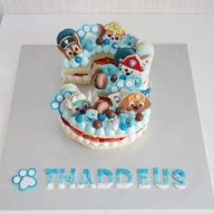 there is a birthday cake that has animals on it