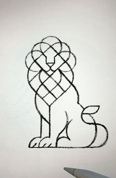 a drawing of a lion sitting on top of a piece of paper