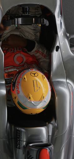 the inside of a car with a helmet in it