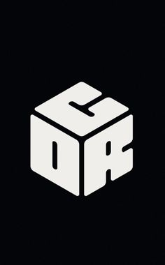 a black and white image of a cube with the letter d on it's side