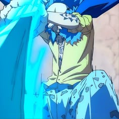 an anime character with blue hair wearing a yellow shirt and holding his hands to his head