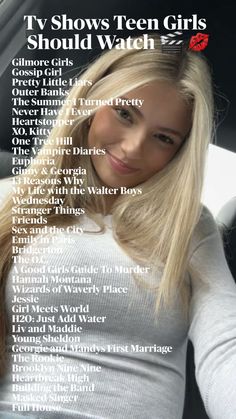 a woman with long blonde hair sitting in a car