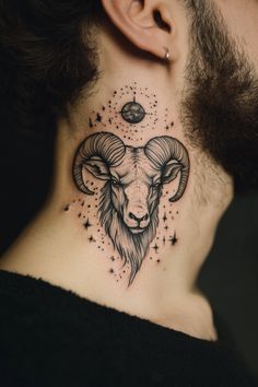 a man with a goat head tattoo on his neck and behind him is the moon
