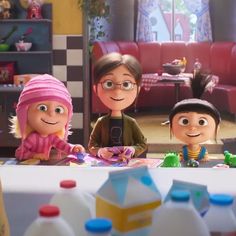 the characters from inside out are sitting at a table