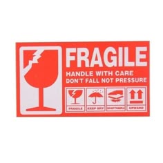 a red and white sticker that says fragile handle with care don't fall not pressure