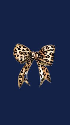 a leopard print bow on a blue background
