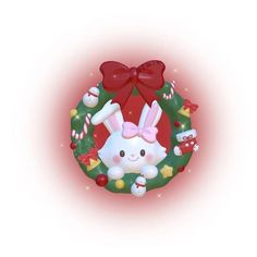 an image of a christmas wreath with bunny ears and bows on it's head