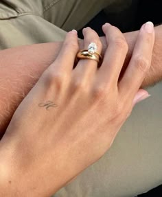 Wife Tattoos For Husband, Wrist Couple Tattoos, Hand Tattoo Initials, Tattoo For Partner, Dainty Tattoos Initials, Engagement Tattoos Finger, Initials Hand Tattoo, Initial Tattoo Hand, Dainty Ring Tattoo