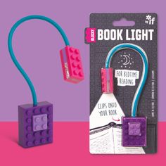 the book light is made out of legos and has a cord attached to it