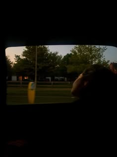 girl looking out of car window on night drive/ sunset drive/ blasting music in car/ late night drives/ head out of car window/ car window late night drive/ aesthetic night driving picture with girl’s hair blowing in the wind