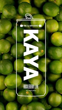 a can of avocado with the word ava on it in front of a pile of limes