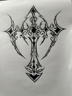 a cross tattoo design on white paper