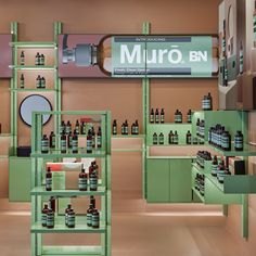the store is filled with many different types of bottles and shelves that hold various items